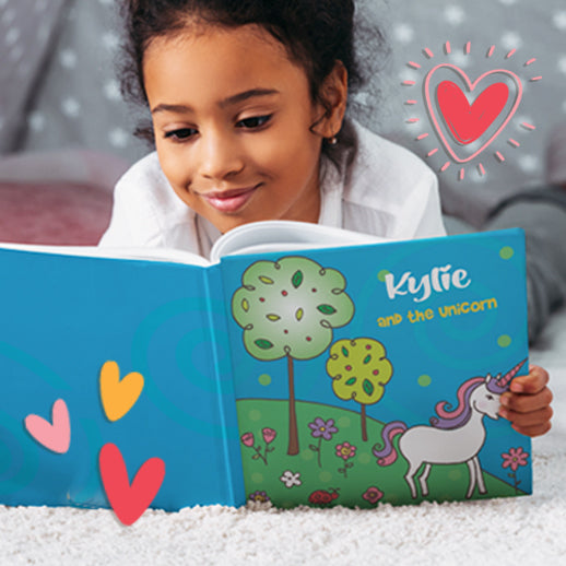 Girl reading personalized children's book